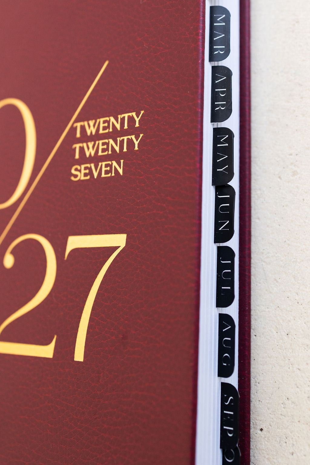 Close-up of the gold foil 2027 cover and monthly tabs
