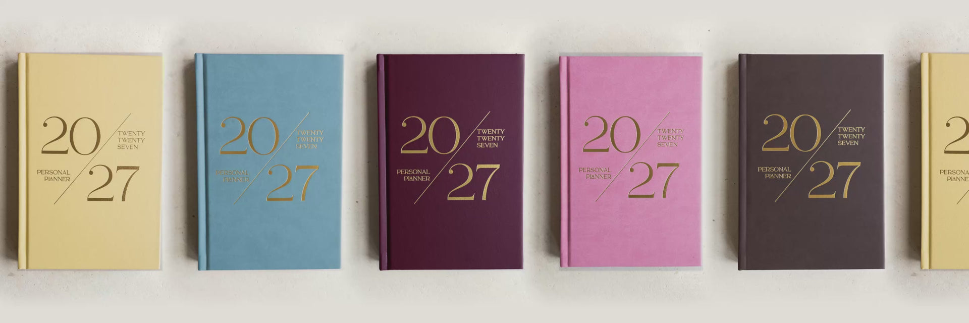 2027 Mika Personal Planners in all five colours sliding across